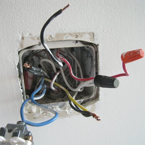 If there is loose wiring in the wall outlet or hardwire connection, it could be causing short circuits or small electrical surges.