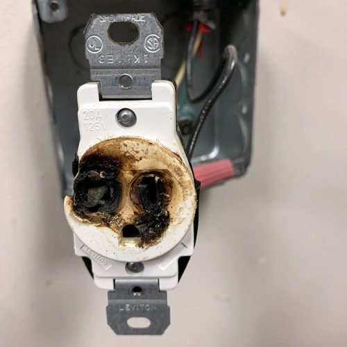 What can cause a outlet to short circuit?